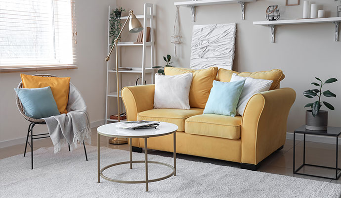 Clean yellow sofa in a modern living room