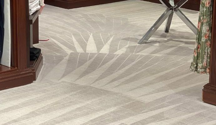 Clean carpet in a room.