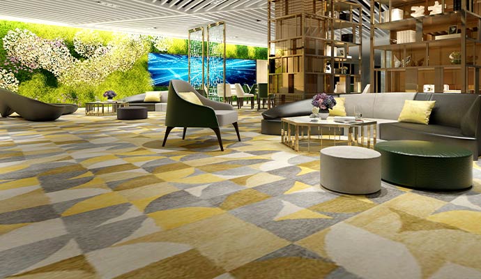 Modern commercial lounge with clean carpet flooring, stylish seating and elegant interior design
