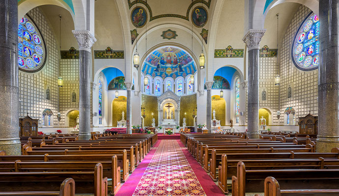 Clean red carpet in a large church aisle