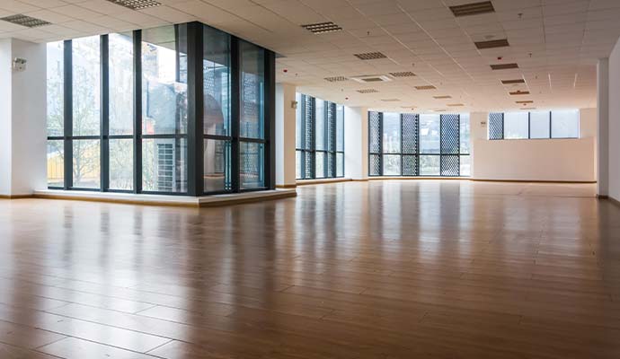 Polished laminate plank flooring in a commercial office space