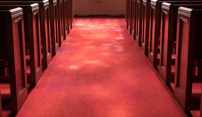 Clean red carpet inside a church