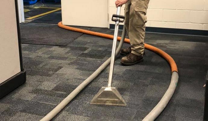 Professional cleaning carpet using equipment
