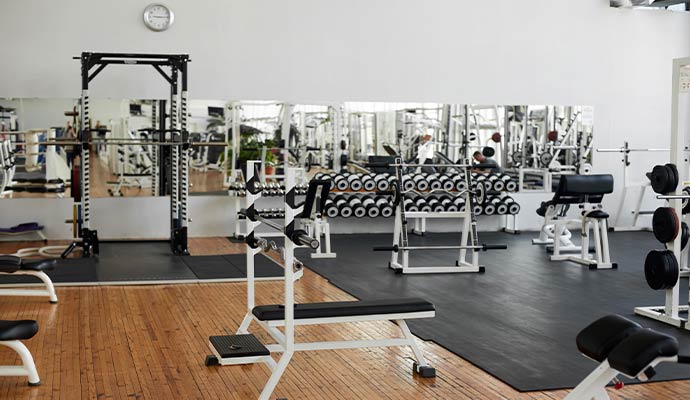 Various types of gym equipment inside a fitness center