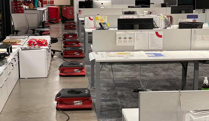 Water restoration service with equipment in commercial space