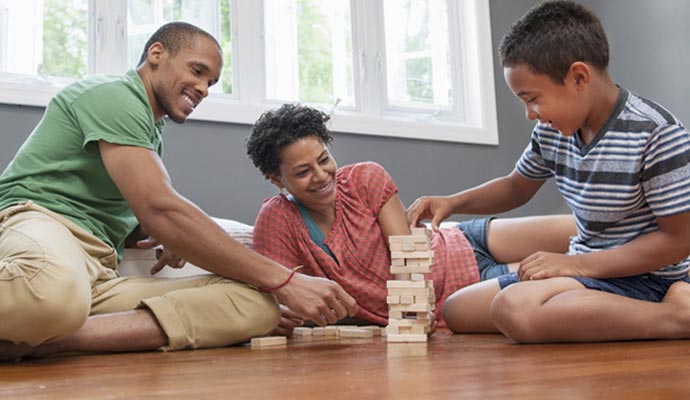 Family enjoying on laminate floor