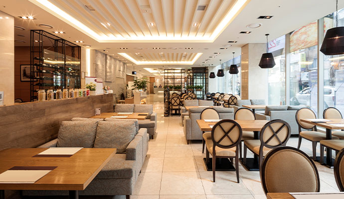 Commercial restaurant dining room interior restored after fire damage.