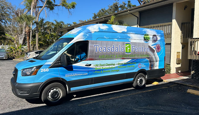 Teasdale Fenton Air Duct Cleaning service van parked outside in Sarasota.