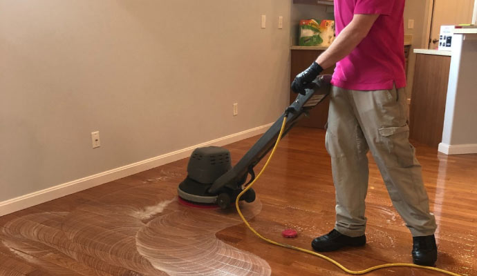 Professional worker laminating floor