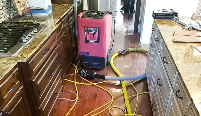 Phoenix dehumidifier in kitchen during restoration