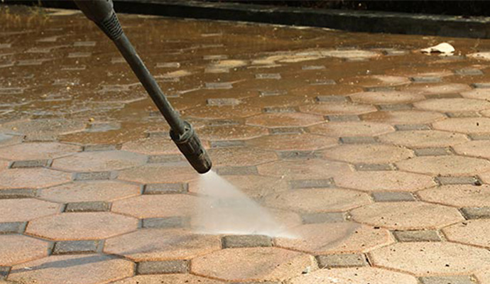 Pressure washing service for hard surface