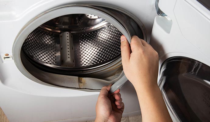 Washing machine with a faulty door seal.