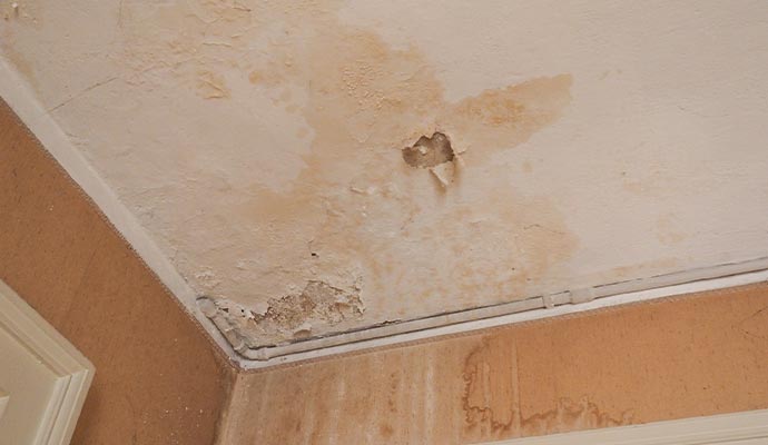 Water damaged ceilings with water stains