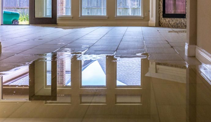 Water damaged floor due to plumbing leaks
