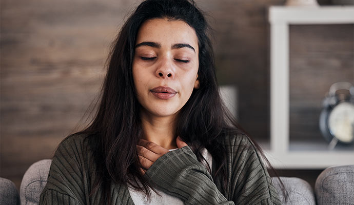 Woman experiencing breathing difficulty